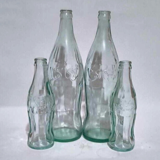 Lot 4 Collection of vintage Coca-Cola bottles of embos arabic writting old clean