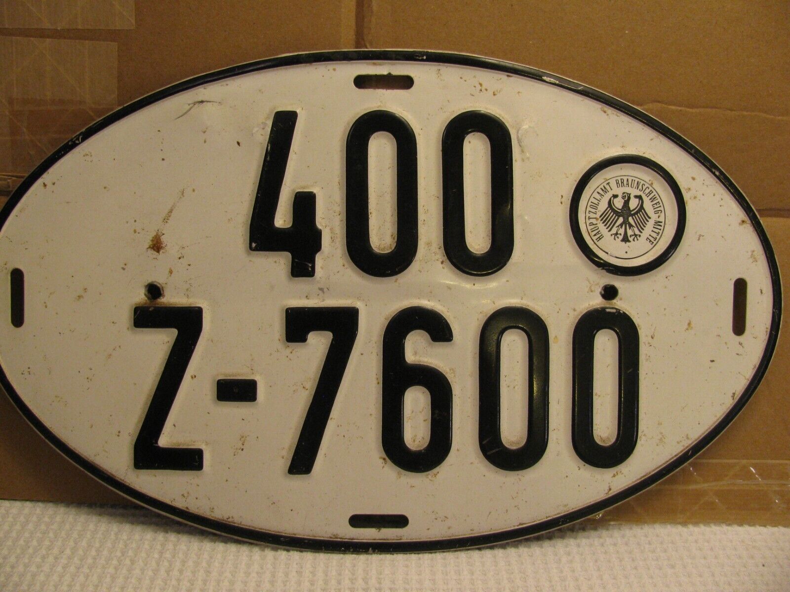 Vintage German Oval Metal Vehicle License Plate Tag ~ Black / White 13.5x8