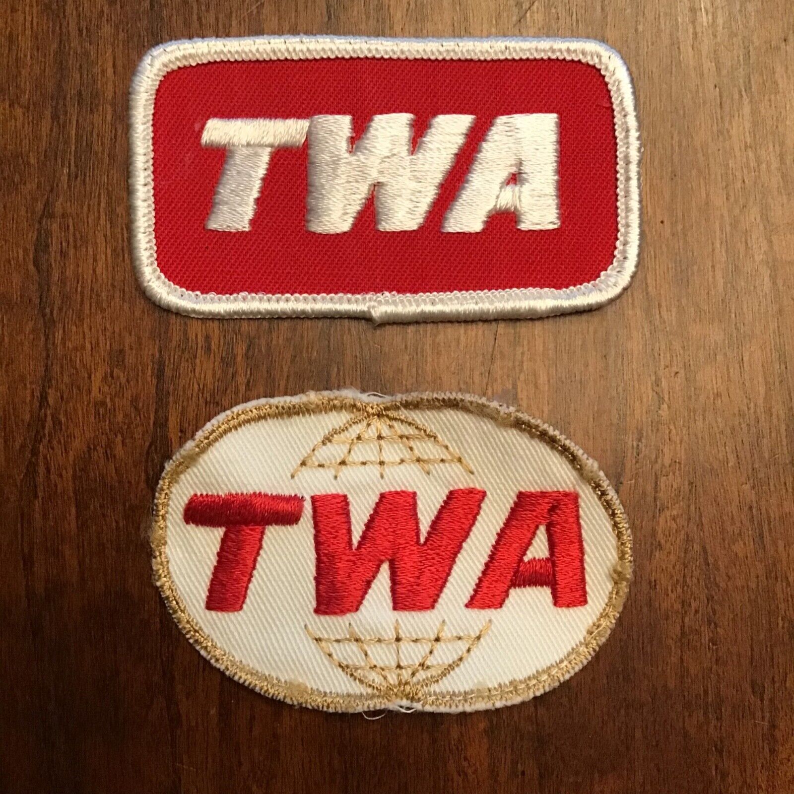 TWO VINTAGE TRANS WORLD AIRLINES UNIFORM PATCHES