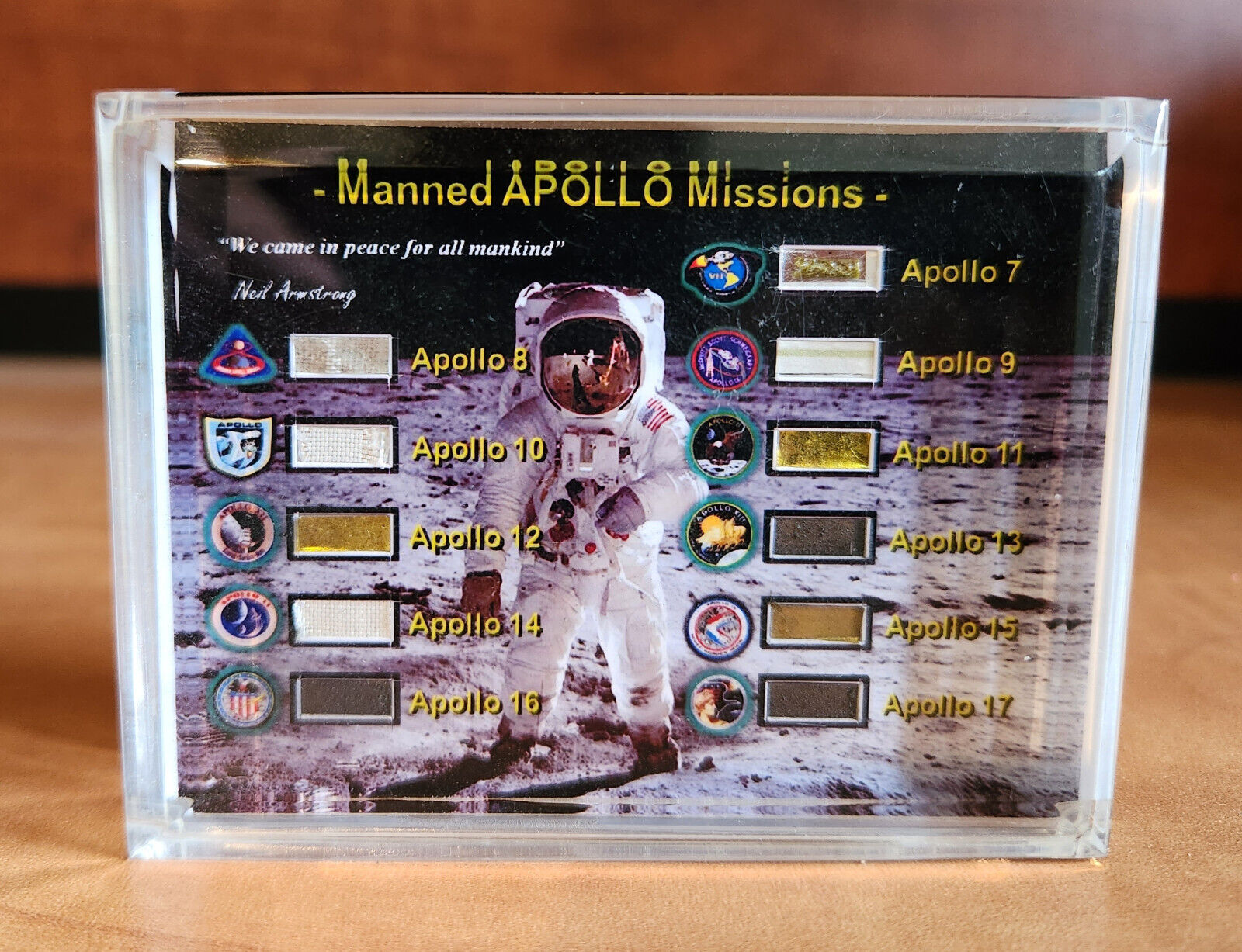 11 Fragments of Manned Apollo Missions in lucite display