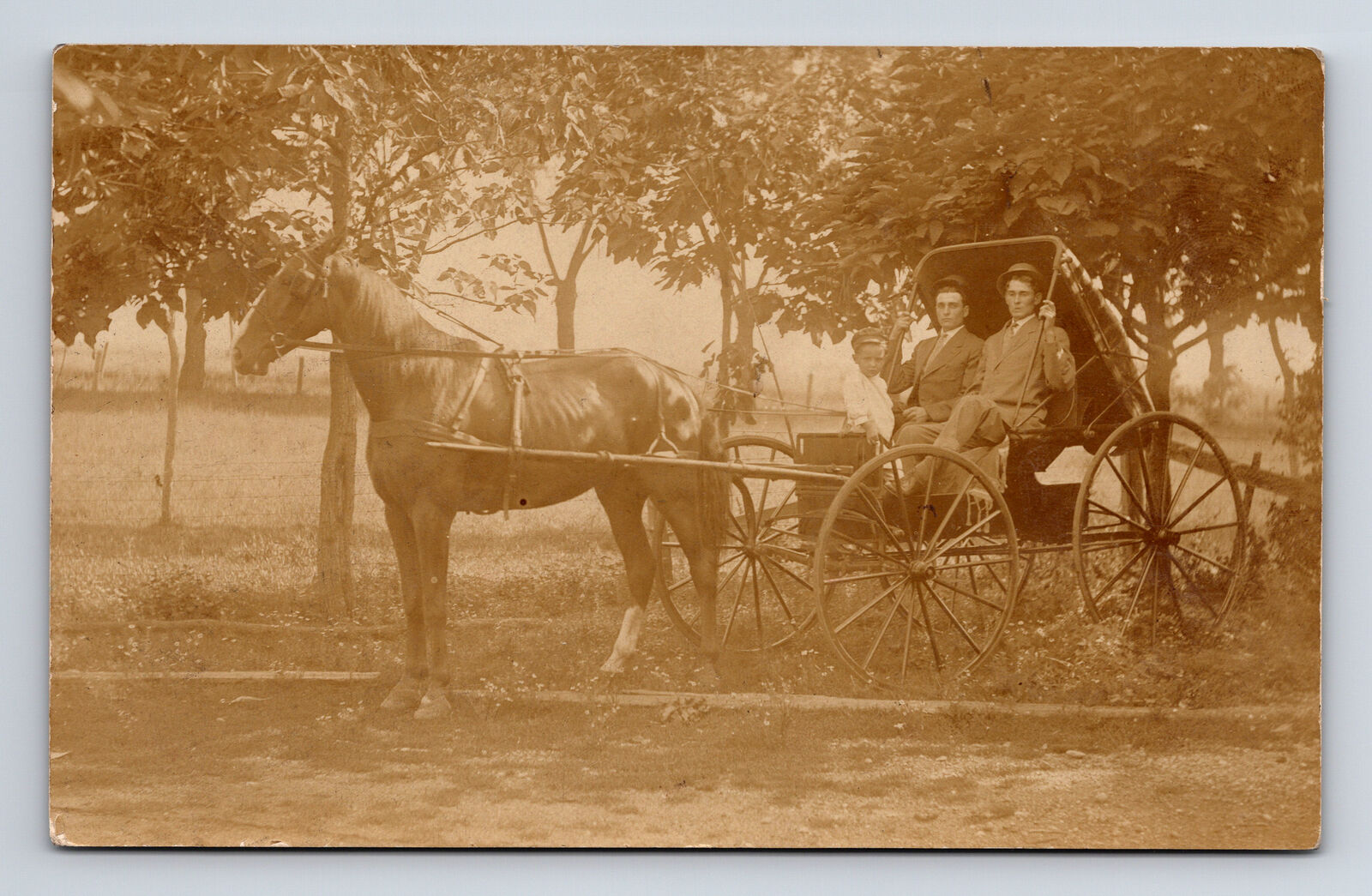 c1909 RPPC Two Men & Child in Horse Drawn Buggy Postcard Posted to Rochelle IL