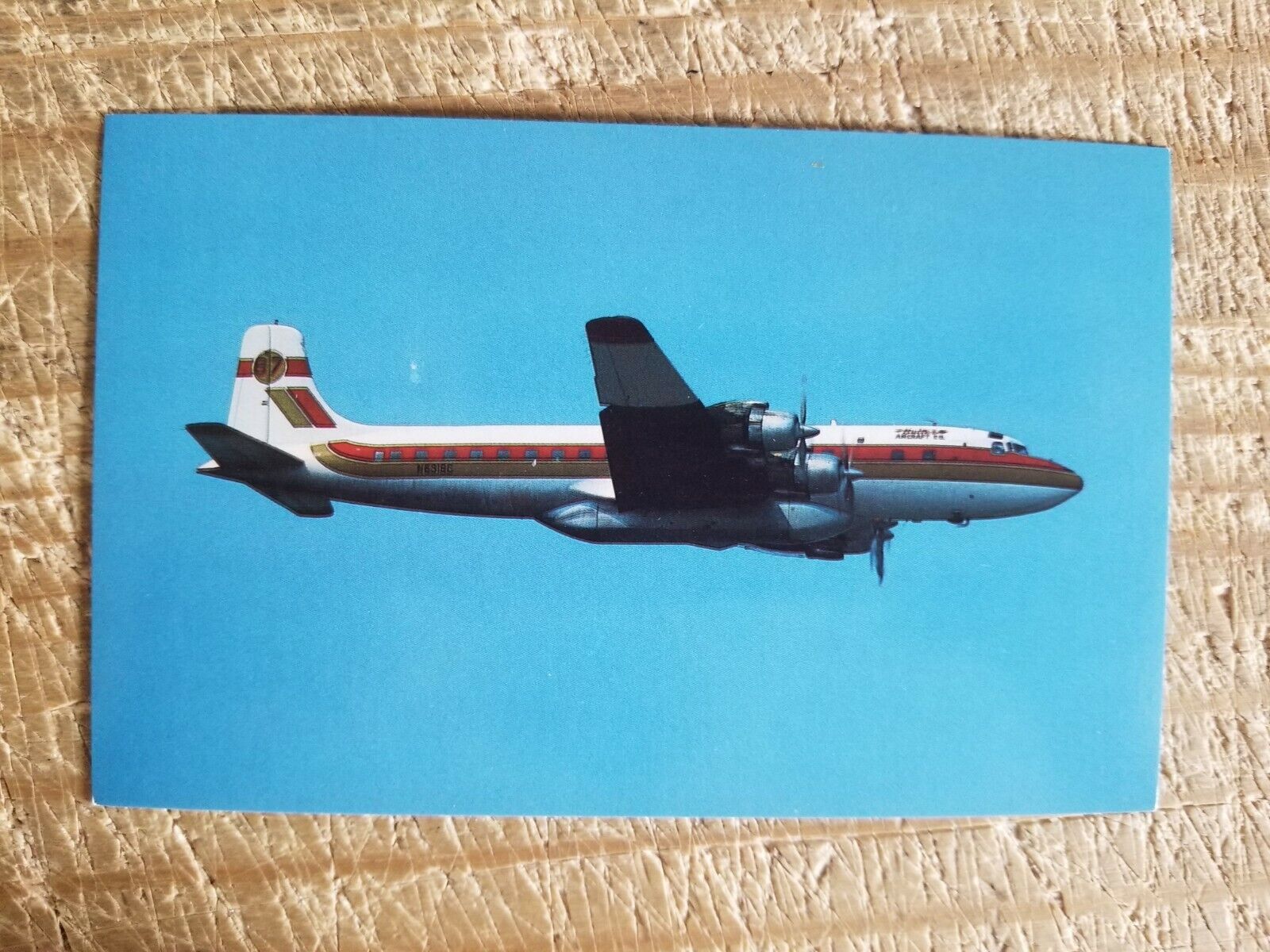 BUTLER AIRCRAFT COMPANY Douglas DC-7 Four Engine Propeller Airliner Postcard*P3