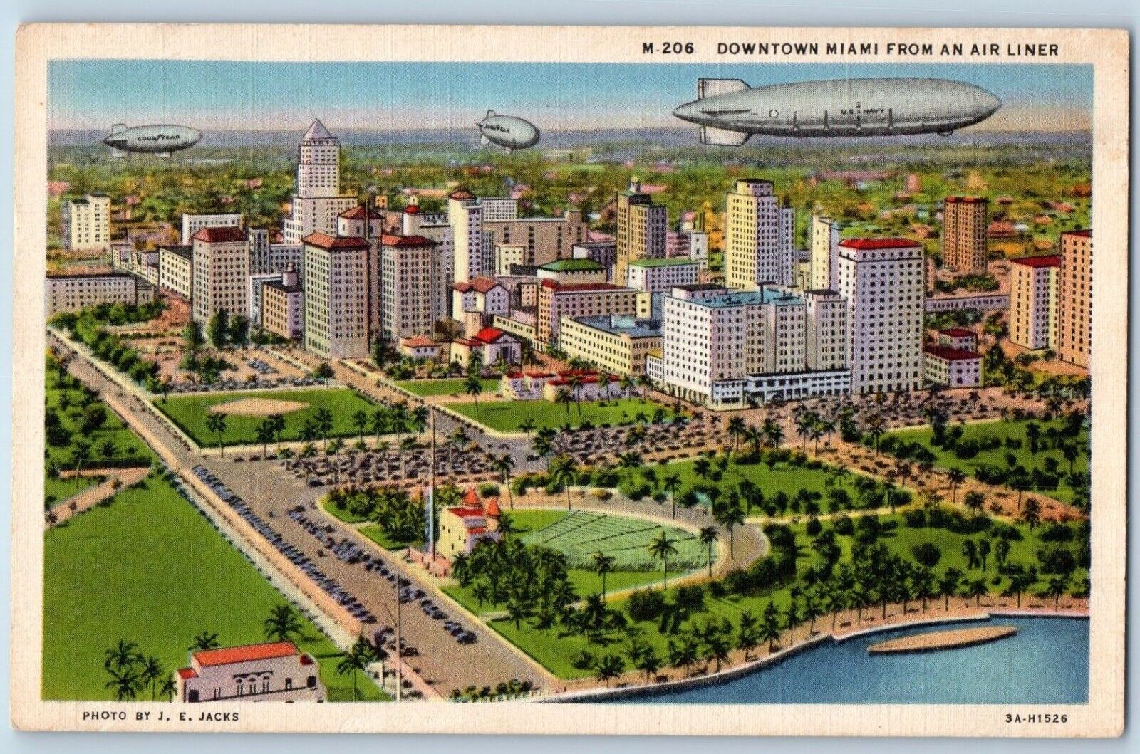 Miami Florida Postcard Downtown Miami Air Liner Buildings Lake Road Trees 1940