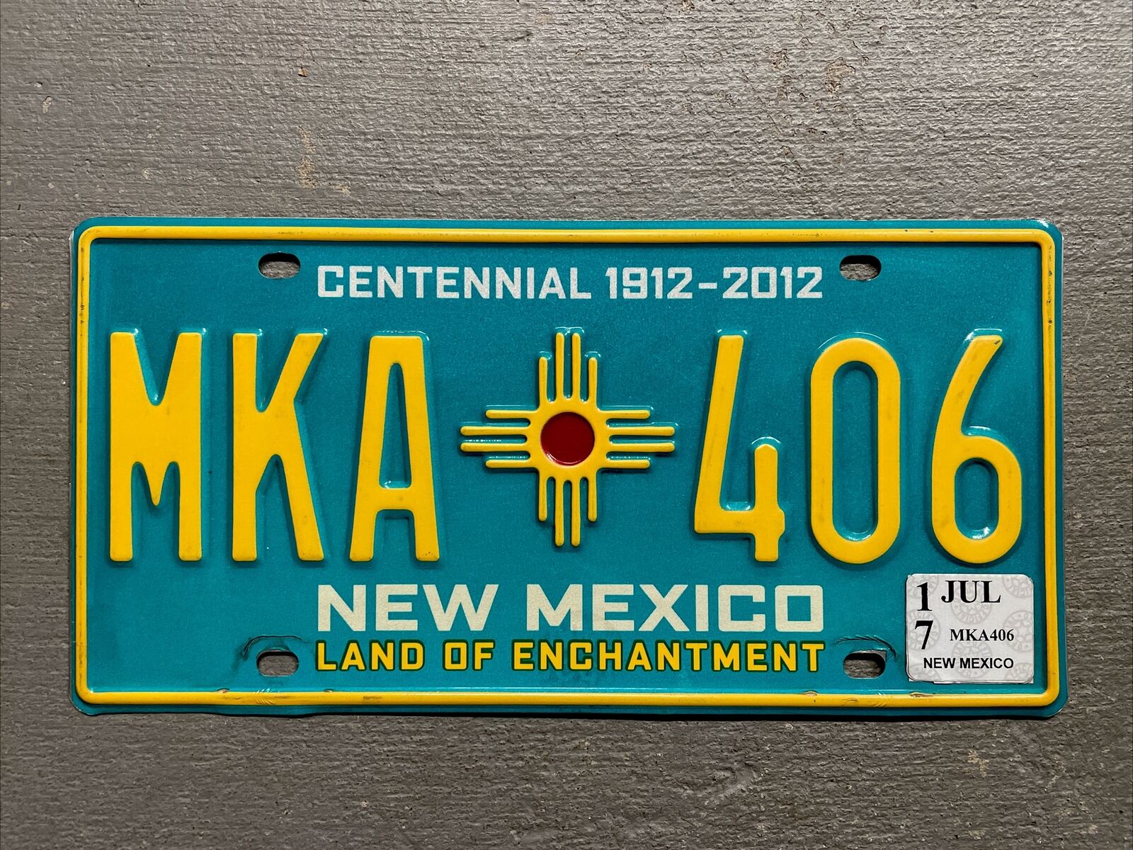 NEW MEXICO LICENSE PLATE TURQUOISE CENTENNIAL/LAND OF ENCHANTMENT MKA-406 2017😎