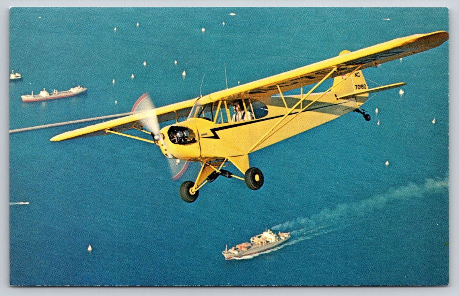 Aircraft Collector Series~Yellow Piper J-3-C65 In Flight Over Ocean~Vtg Postcard