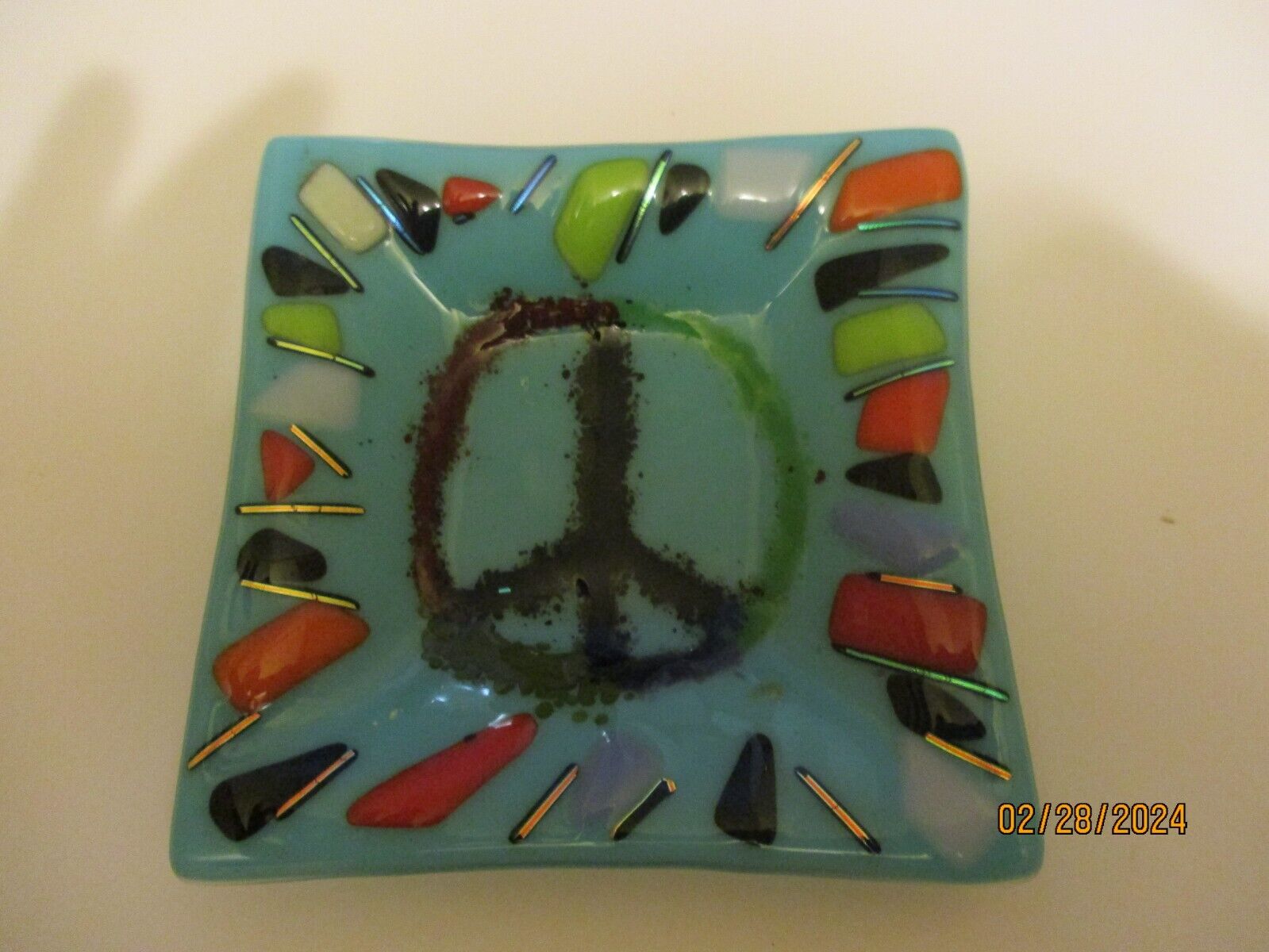 ashtray or dish fuse glass with peace sign in the middle