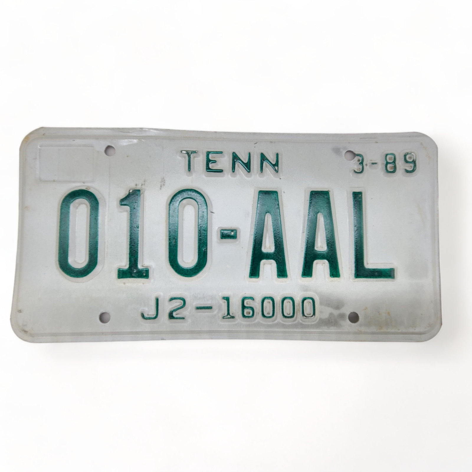 1989 Tennessee Metal License Plate Green On White #010-AAL