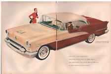 1954 Oldsmobile PRINT AD Features Two tone Two door Deluxe Holiday Coupe picture