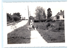 Vintage Photo May 1944, Woman walking her baby and dog down the street , 4.5x3.5 picture