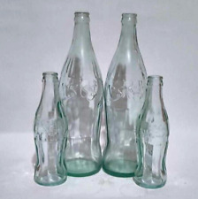 Lot 4 Collection of vintage Coca-Cola bottles of embos arabic writting old clean picture