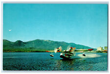 c1950's Alaska Coastal-Ellis Amphibian Airplane Going to Southeast AK Postcard picture