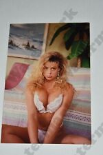 close up busty blonde woman in white lingerie Vintage photograph an picture