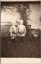 1910s RPPC Photo Postcard Two Angry Kids in Matching New Outfits / House Yard picture