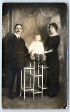 Postcard Studio Photo of Family with Small Child (Back Damage) RPPC J163 picture