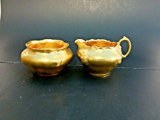 Gold Colored Porcelain Sugar and Creamer set from estate sale picture