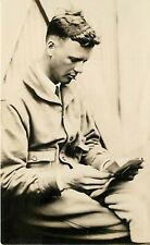 RPPC Postcard Charles Lindbergh in Flight Suit reading Papers, France, Underwood picture