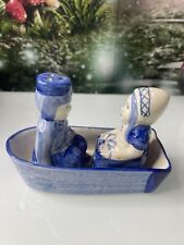 Handpainted DELFT BLUE Dutch Boy Girl Salt & Pepper Shakers in Boat picture