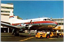 Airplane SWA-Southwest Airways Martin 2-0-2 San Francisco Int'l Airport Postcard picture
