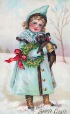 CHRISTMAS - Girl Holding Puppy Silk Covered From Santa Claus Postcard -udb- 1907 picture