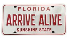 Florida Arrive Alive Red White Booster License Plate Sunshine State FHP Trooper picture