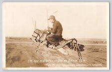 Postcard RPPC Kansas Garden City Man Riding Locust Exaggeration Antique picture