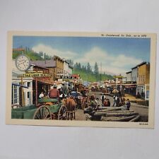 Deadwood S Dakota Main Street 1876 Horses Covered Wagons Signs Linen Postcard picture